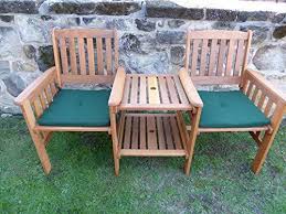 Elder couple smiling and relaxing seated in the garden. Uk Gardens Heavy Duty Brown Wooden Garden Love Seat Bench With Parasol Uk Gardens Co Uk