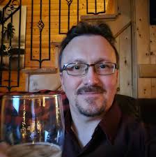 Lost dark brown men's zip wallet at Chevron station