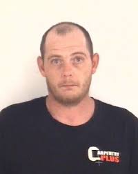 Two arrested after SWAT team serves search warrant in burglary  investigation