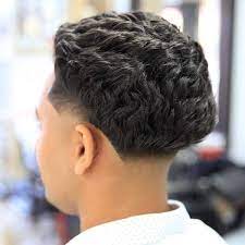 50 Best Blowout Haircuts For Men Cool Blowout Taper Fade Styles 2021 Blowout Haircut Side Part Haircut Haircuts For Wavy Hair