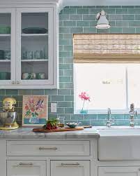 Check out these incredible kitchens… via better homes and gardens Better Homes Gardens On Instagram What A Peaceful Space Seafoam Green Subway Tile Bring Green Subway Tile Kitchen Tiles Design Kitchen Tiles Backsplash