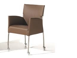 Buy upholstered dining chairs from a wide range of colours. Joli Monet Upholstered Chair With Armrests With Castors