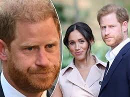 Moment blundering Prince Harry knocks