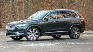 Inside, there's an elegant interior with premium materials, spacious seating, and expansive cargo room. 2021 Volvo Xc90 Recharge Review More Tired Than Wired