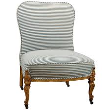 Fireside Chair Everything Looks Better In A Nice Blue Ticking Fireside Chairs Upholstered Chairs Wicker Dining Chairs