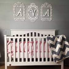 Pink And Grey Nursery I Love How Her Name Turned Out Above The Crib Pink And Gray Nursery Baby Nursery Themes Grey Nursery