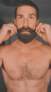 The somewhat daily routine: During the first couple of months of growing  out a beard, I slowly bring down the neckline as the beard gets longer.  Trimming and cleaning up the sides of the beard while ...