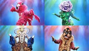 The leopard is golden brown with black spots, and has short ears, fangs, and bright green feline eyes. The Masked Singer Episode 9 Recap Flamingo Flower Leopard Rott Goldderby