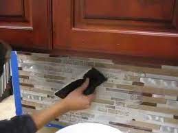 Apply the mixture by spreading the substance over the tiles using a float. How To Grout A Kitchen Backsplash Youtube