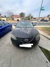Image result for Black 2007 Mazda3