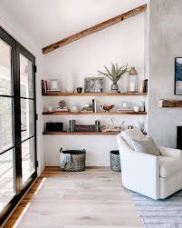 This living room shows a great example of how to use a white couch against a white wall. Few Simple Steps To Comfy And Cozy Simple Living Room Decor Black That Combine Style With Practicality Living Room Ideas