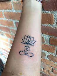 As a tattoo lover, you may have seen a lot of lotus tattoo designs. Lotus Om Infinity Tattoo Om Tattoo Design Om Tattoo Infinity Tattoo