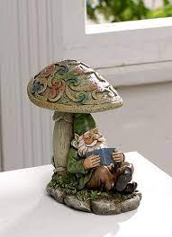 'garden dwarfs') are lawn ornament figurines of small humanoid creatures known as gnomes. Mischievous Celtic Gnomes Reading Shop Irish Www Shopirish Com Gnomes Gnome Garden Funny Garden Gnomes