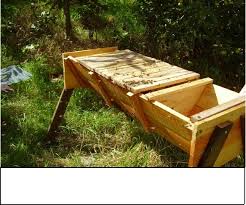 It features individual bars laid across the top of the hive cavity. How To Build A Simple Top Bar Hive Top Bar Bee Hive Bee Keeping Top Bar Hive