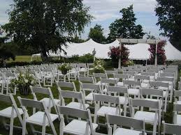 White Resin Folding Chairs Arranged For Wedding Ceremony With Pole Tent In Background For Reception From House Of Rental Sk Garden Chairs Wedding Chairs Chair