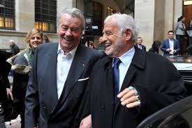 Born 9 april 1933) is a french actor initially associated with the new wave of the 1960s and one of the biggest french film stars of the 1960s. Belmondo Et Delon Complices Au 36 Quai Des Orfevres