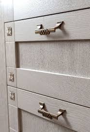 The decorative ends of these handles dress them up, making a statement that stands out against the other pulls in the crowd. 35 Kitchen Cabinet Hardware Ideas For Every Design Style