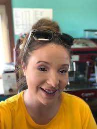 What type of white face cream is Eric applying that the rain doesn't wash  it off until the final battle?