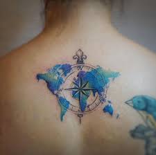 Watercolor compass tattoo on a side. Watercolor Compass Tattoo On Back