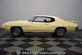 Image result for Canary Yellow 1970 AC Cars