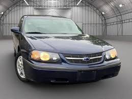Image result for Medium Green 2002 Impala