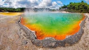 Champagne Pool Hot Spring Glowing In Multiple Colors Waiotapu Rotoua New Zealand C9a033d7880e42a0a3ae844c27f93986 Hot Springs Spring Glow Places To Go
