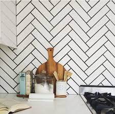 Interesting Shape Contrasting Grout Ooh La La Mode Herringbone Tiles Kitchen Trendy Kitchen Backsplash Kitchen Splashback