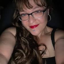 UPDATE: The suspect tried to rob a woman in the parking garage, then  stabbed her in the chest. A suspect is in custody.