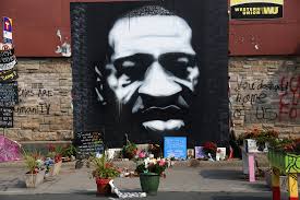 Two police officers stand on the roof of the third police precinct during a face off with a group of protesters. Immigrant Business Owners In Minneapolis Are Hit Hard As Crime Surges Bloomberg