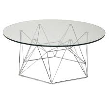 Tempered rectangular glass top carries its shape down to the metal base. Glass Geometric Coffee Table
