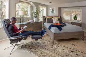 Modern and midcentury modern decor embrace natural materials, particularly wood, as seen in the primary bedroom from capital building shown here. Circle Furniture How To Decorate A Modern Master Bedroom