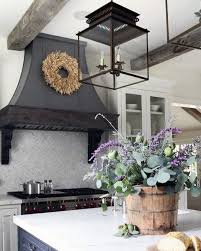 Matching these grey slate tiles with wood and stone materials is a popular technique for creating a rustic design. Top 60 Best Rustic Kitchen Ideas Vintage Inspired Interior Designs