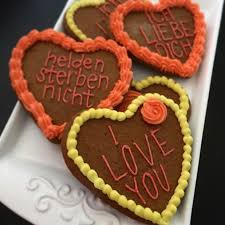 Lebkuchenherzen My Vegan Version German Gingerbread Heart Cookies Decorated With Vanilla Buttercr Heart Cookies Decorated Frosting Recipes Cookie Decorating