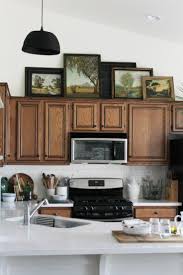 But, i only did this on one side of our kitchen. 9 New Ideas For Decorating Above Your Kitchen Cabinets Above Kitchen Cabinets Kitchen Cabinets Decor Decorating Above Kitchen Cabinets