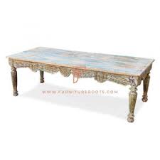 Mahogany solids and a distressed round coffee table is a clear glass terrarium doubles as it a touch of storage. Vintage Coffee Tables Suppliers Antique Coffee Tables In Distressed Styles