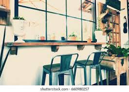 Metal is a very sturdy material and can easily handle being stacked, transported and set up over and again. Vintage Tables Chairs Coffee Shop Restaurant Stock Photo Edit Now 660980257
