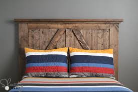 The easiest way you could probably craft yourself a diy wooden headboard is by recycling old pallets. Diy Barn Door Headboard Shanty 2 Chic