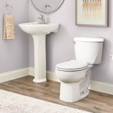 Reliant Two-Piece 1.28 gpf4.8 Lpf Standard Height Round Front Toilet with  Seat