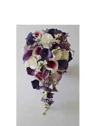 Although small, this bouquet of blue and purple blooms by ponderosa and thyme made a big impact. Purple Cascading Wedding Bouquets Bouquets New Model