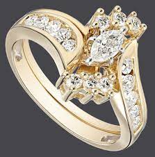 Our sets feature engagement and wedding rings designed to fit seamlessly together. 14k Yellow Gold Bypass Diamond With Marquise Wedding Bridal Ring Set Visuall Co