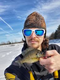 Only fished for 2 hours today because the wind kept trying to take my sled  and gear away.. only 1 baby pike but some cool under water video! Char came  by to
