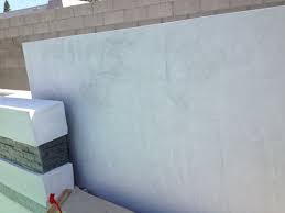 Anyway to stop this without spending another $10000. Inconsistent Smooth Stucco Walls