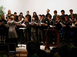 Sandra Rigby-Barrett leading the choir during a concert in the Newbold  College Church