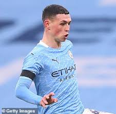 Carlos valderrama is the man with the biggest blonde curly afro hairstyle which stands out in the crowd. How Do Premier League Footballers Maintain Hairstyles Amid Lockdown Daily Mail Online