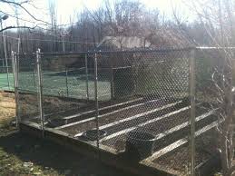 Black chain link fence landscaping. Black Chain Link 1 And A Quarter Inch Mini Mesh Fabric With Galvanized Frame For Garden Fence Ketcham Fenceketcham Fence