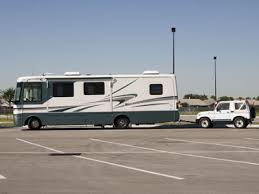 Towing a car with a tow bar. Flat Towing With A Tow Bar Howstuffworks
