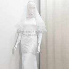Untuk menaikkan lagi seri pengantin, baju kurung moden juga turut dihiasi dengan lapisan lace dan manik. Baju Kahwin Kurung Moden