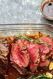 Top slices of beef tenderloin with a rich sauce of cremini mushrooms and sweet red wine. Rosemary Garlic Butter Beef Tenderloin With Red Wine Sauce