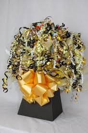 Violets come into mind when you think of a 50th wedding anniversary flower. Golden Wedding Anniversary Sweetie And Chocolate Bouquet From Www Wowcentrepieces Co Uk 50th Wedding Anniversary Chocolate Bouquet Golden Wedding Anniversary