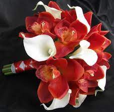 Fun pink bridesmaids bouquets and an elegant white calla lily bouquet pink, white, calla lilies, roses, grass. Orchid Calla Bouquet Love The Balance Between Orchids And Callas And The Sligh White Calla Lily Bouquet Wedding Flower Decorations Calla Lily Bouquet Wedding